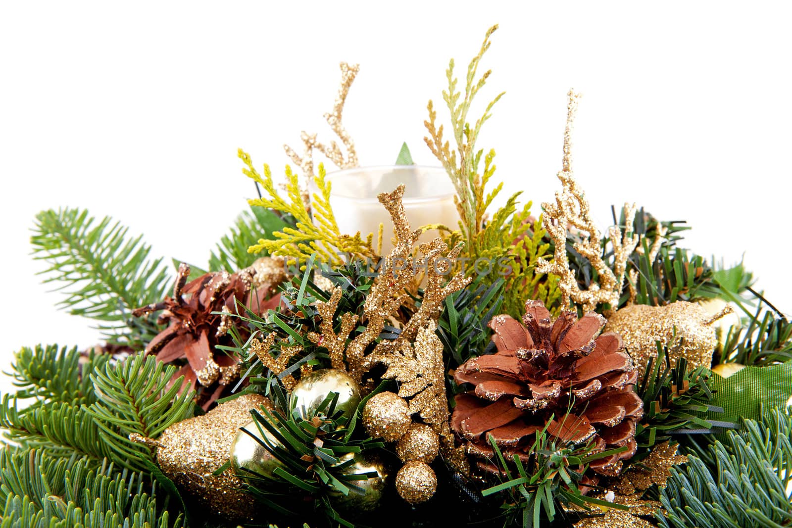 Christmas arrangement in closeup over white background