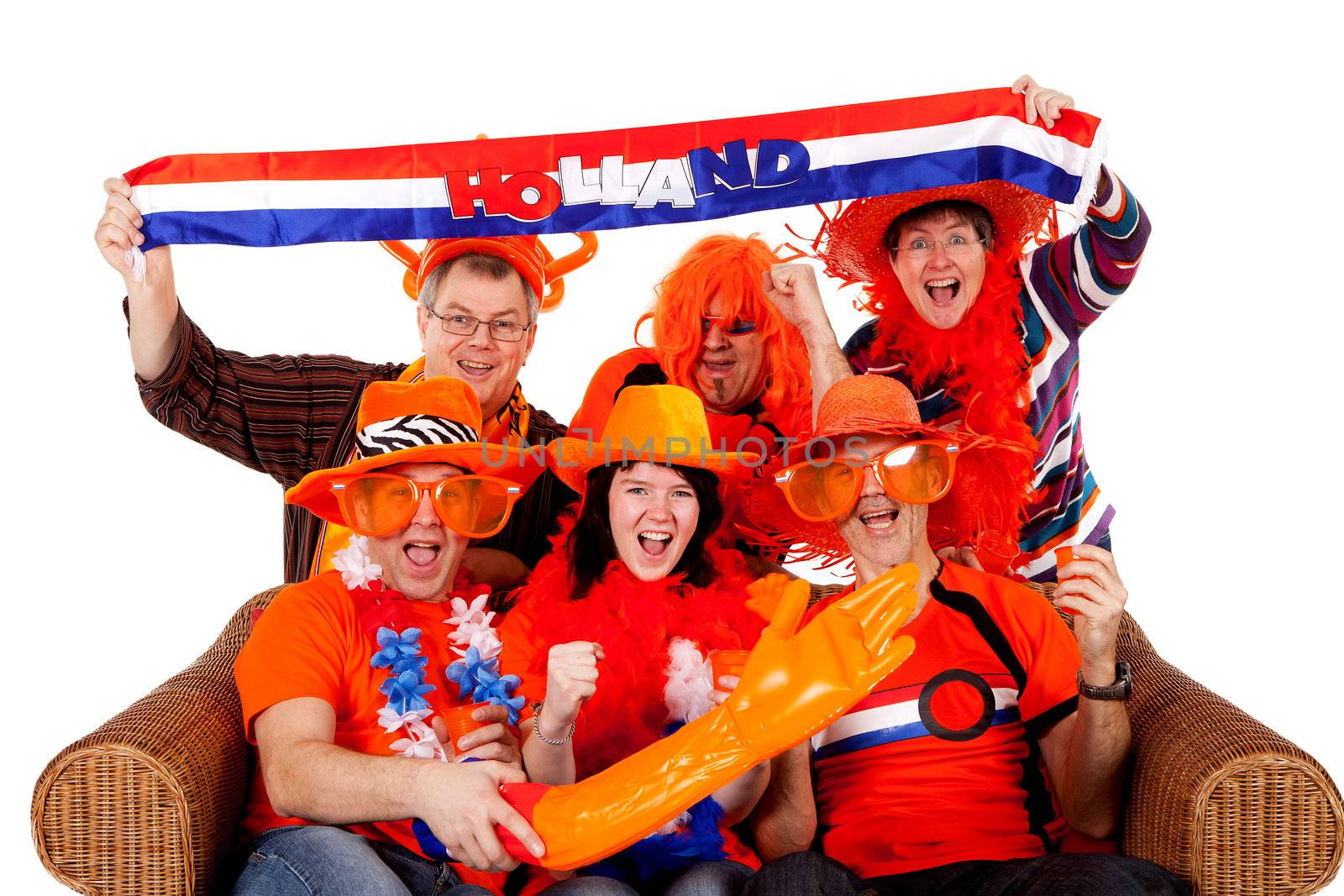 Group of Dutch soccer fan watching game over white background