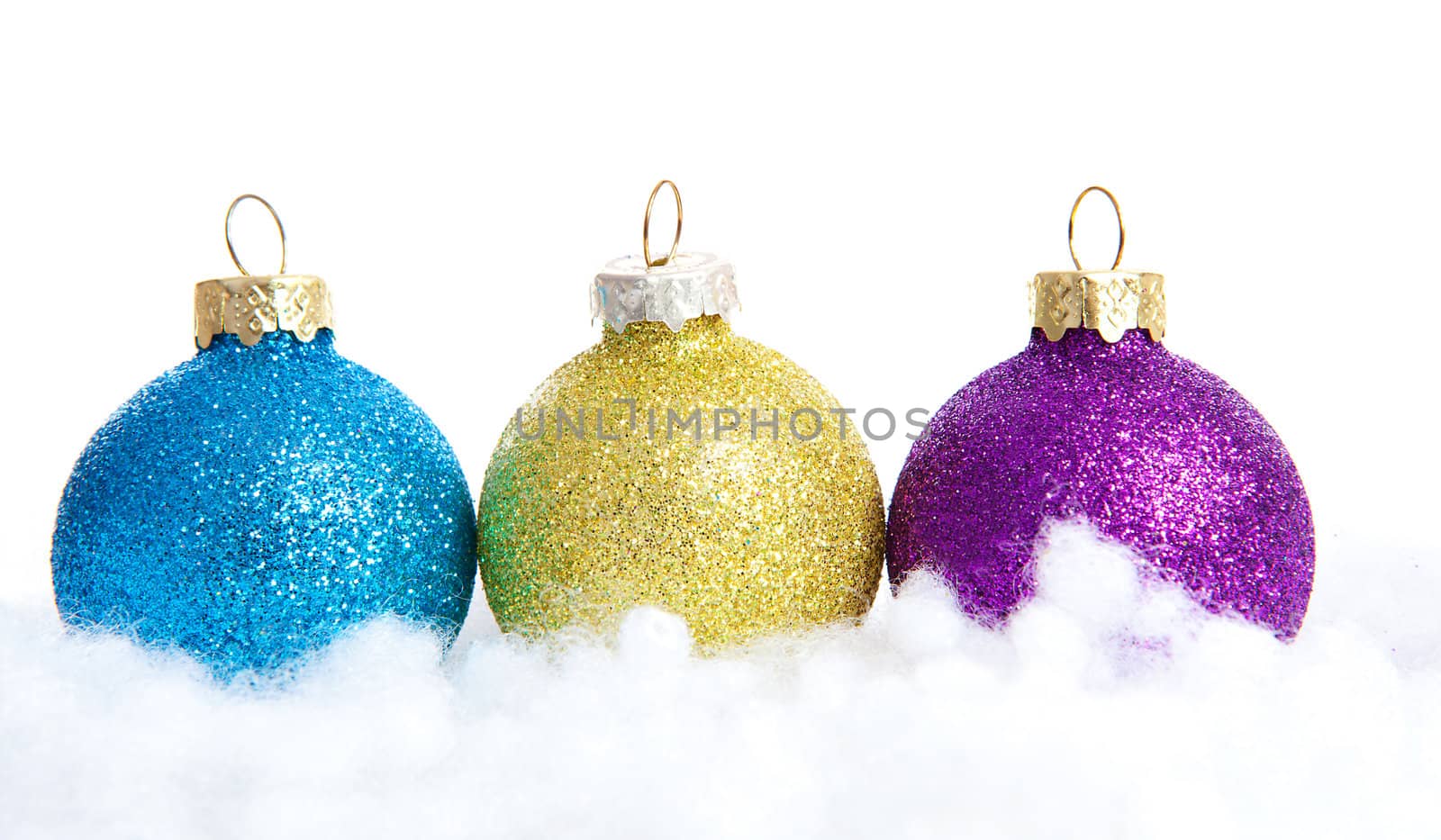 Colorful glitter Christmas balls over white background