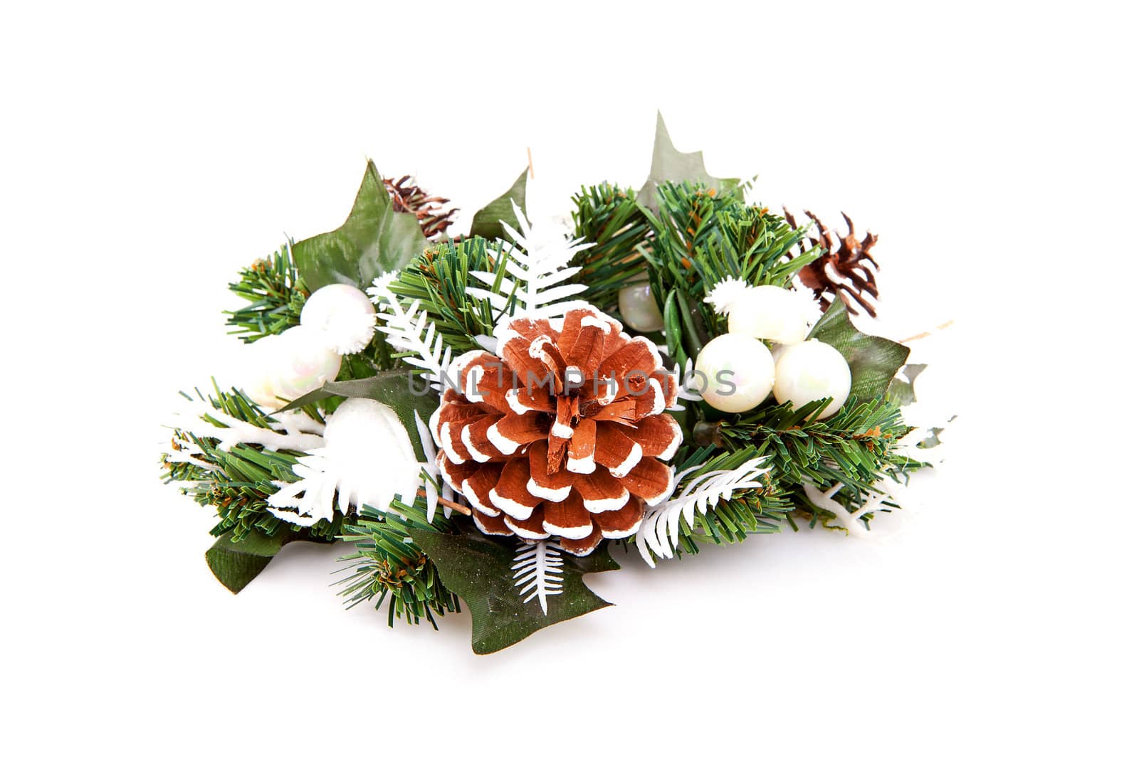 Christmas arrangement in closeup over white background