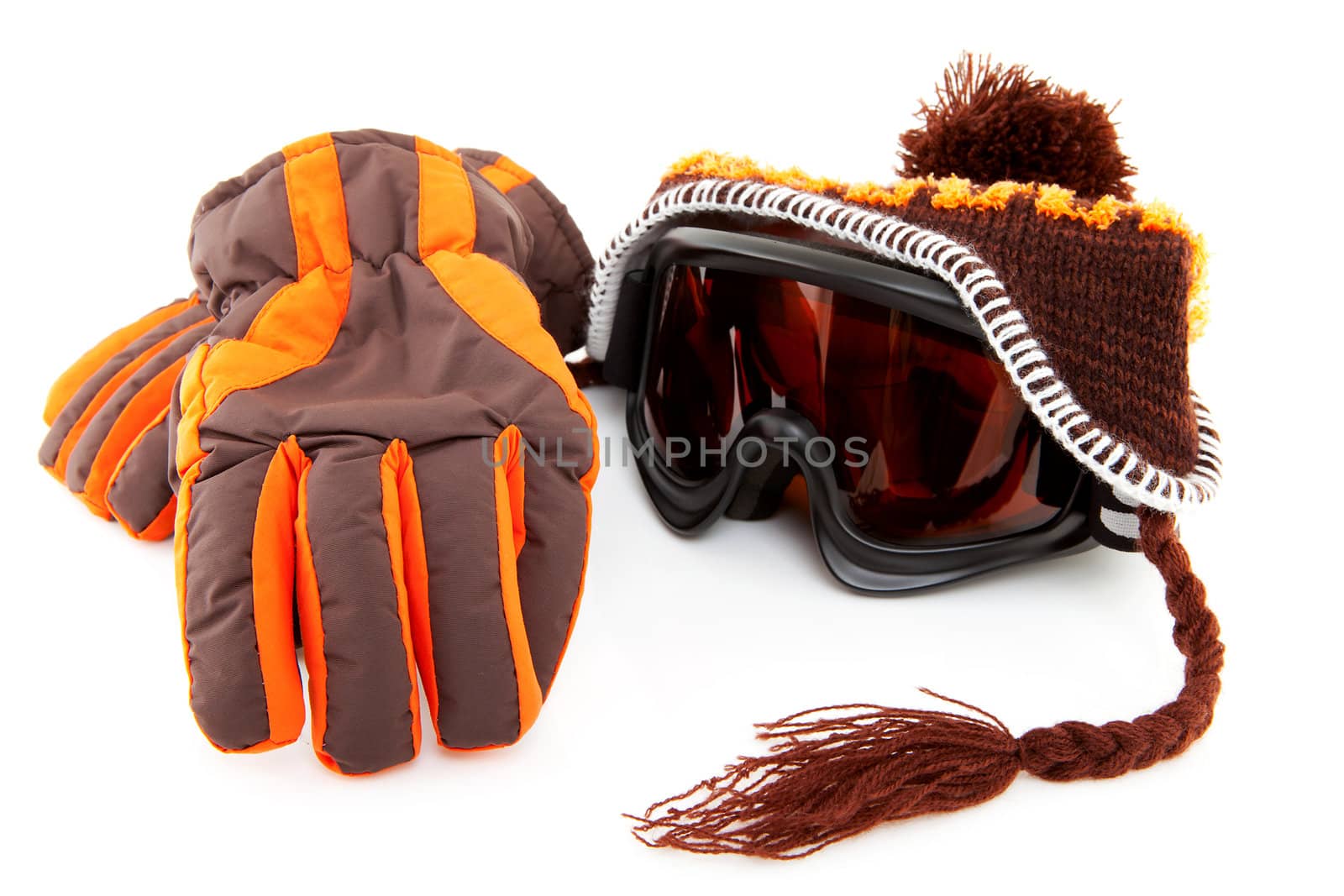 ski goggles, hat and gloves isolated on white background