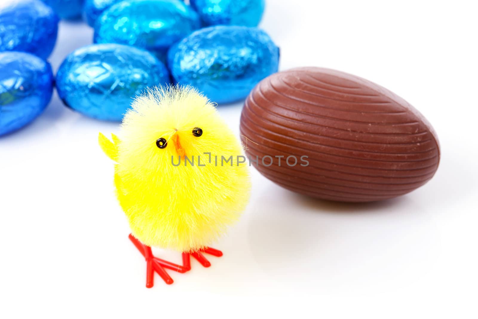 Blue easter eggs and chicken over white background