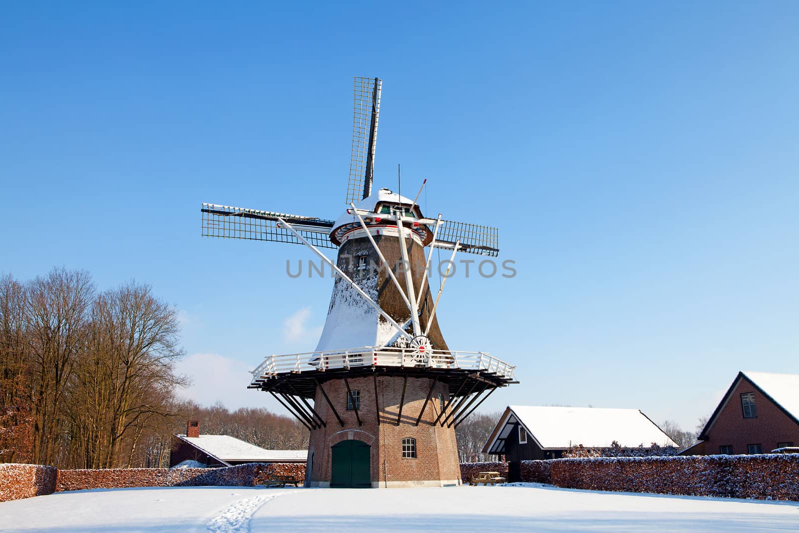 Dutch windmill near Apple in the snow