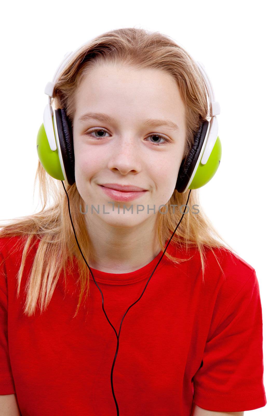 girl is listening to music with headphones on over white background