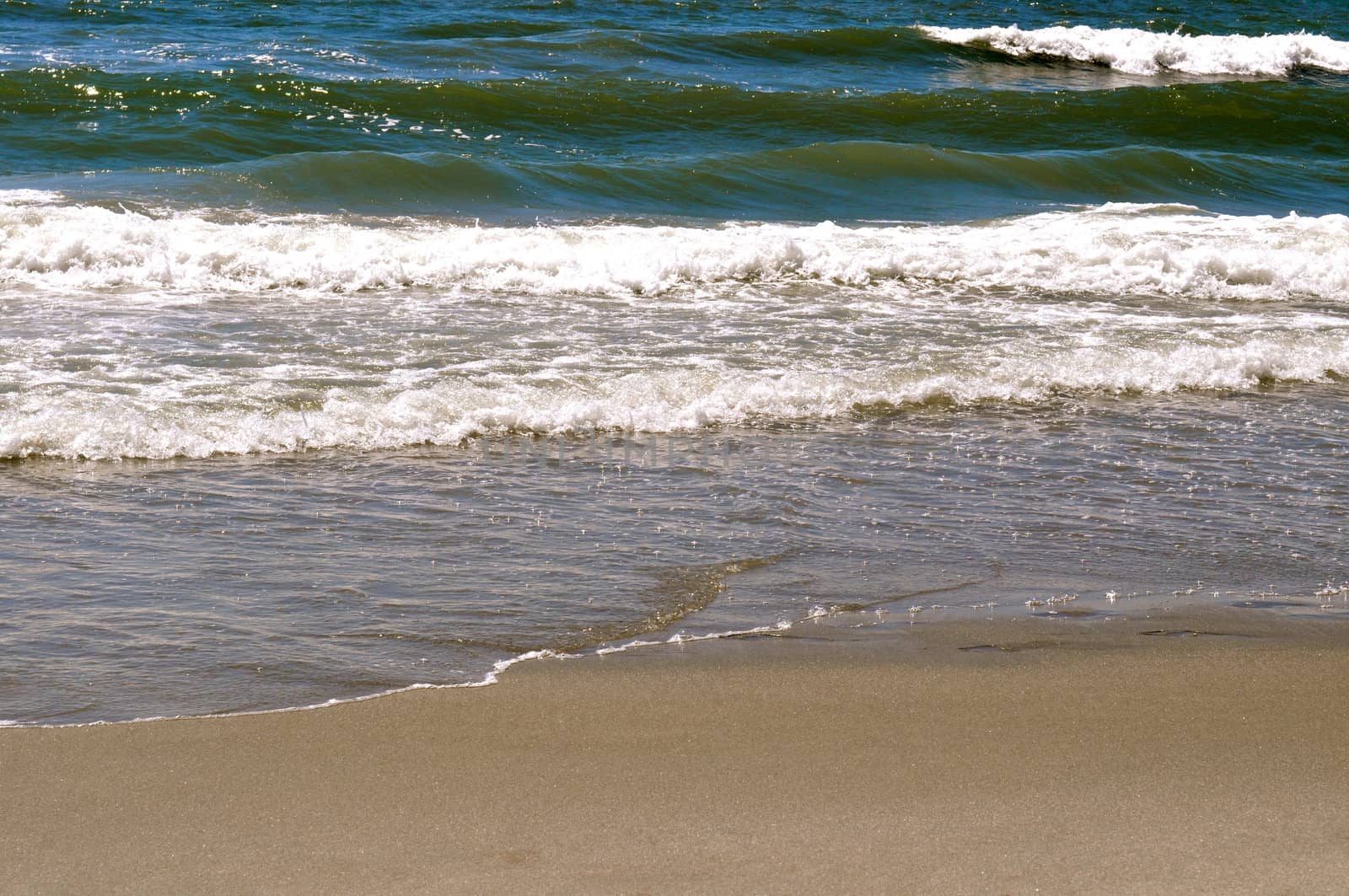 Sand and Waves by RefocusPhoto