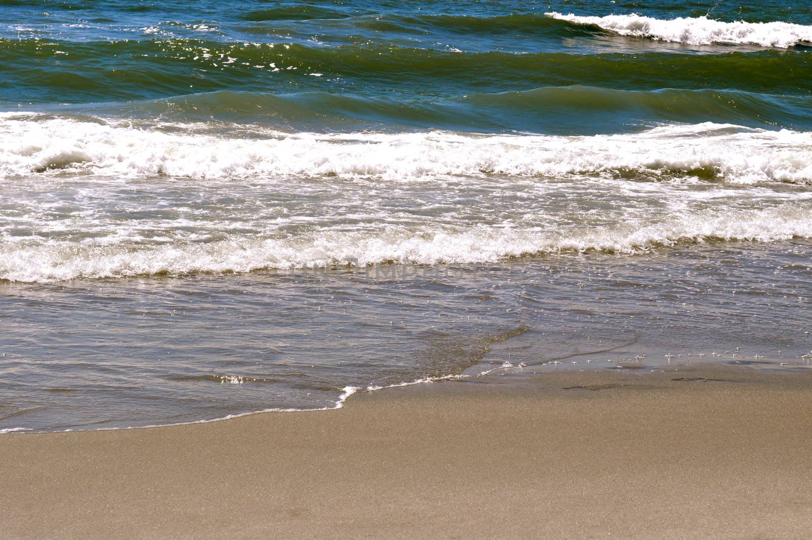 Sand and Waves by RefocusPhoto