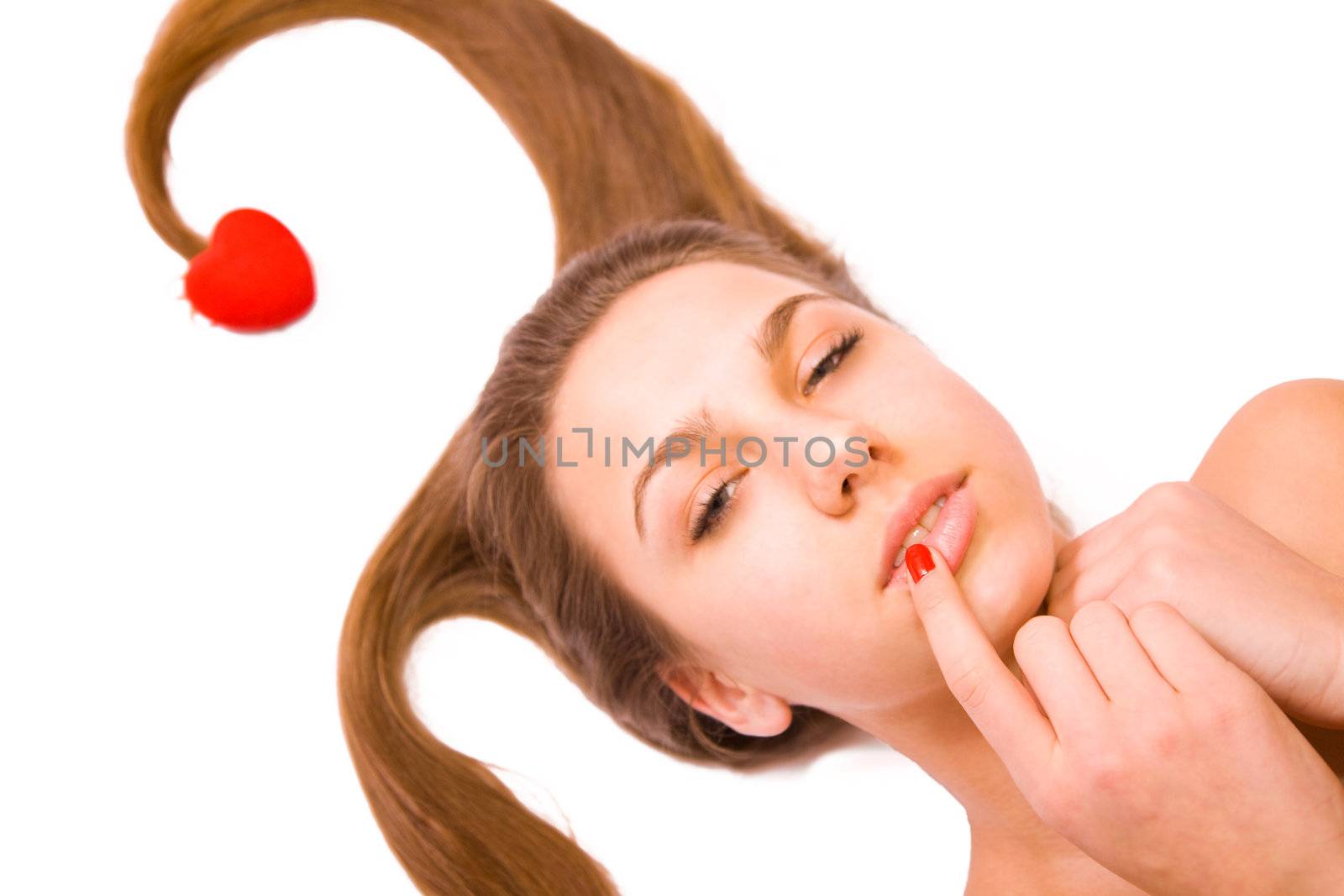 Young teen girl, red heart toy isolated on white
