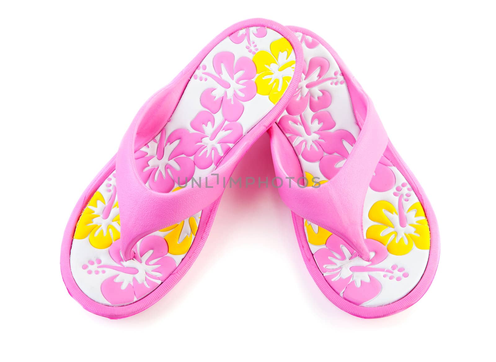Pink summer slippers isolated on white background