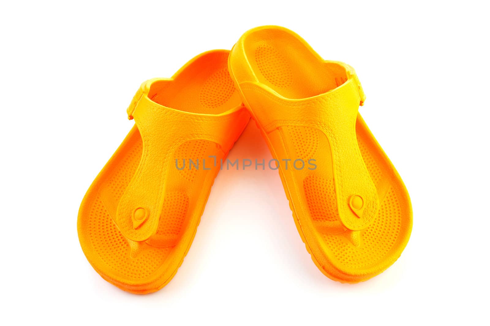 orange summer slippers isolated on white background