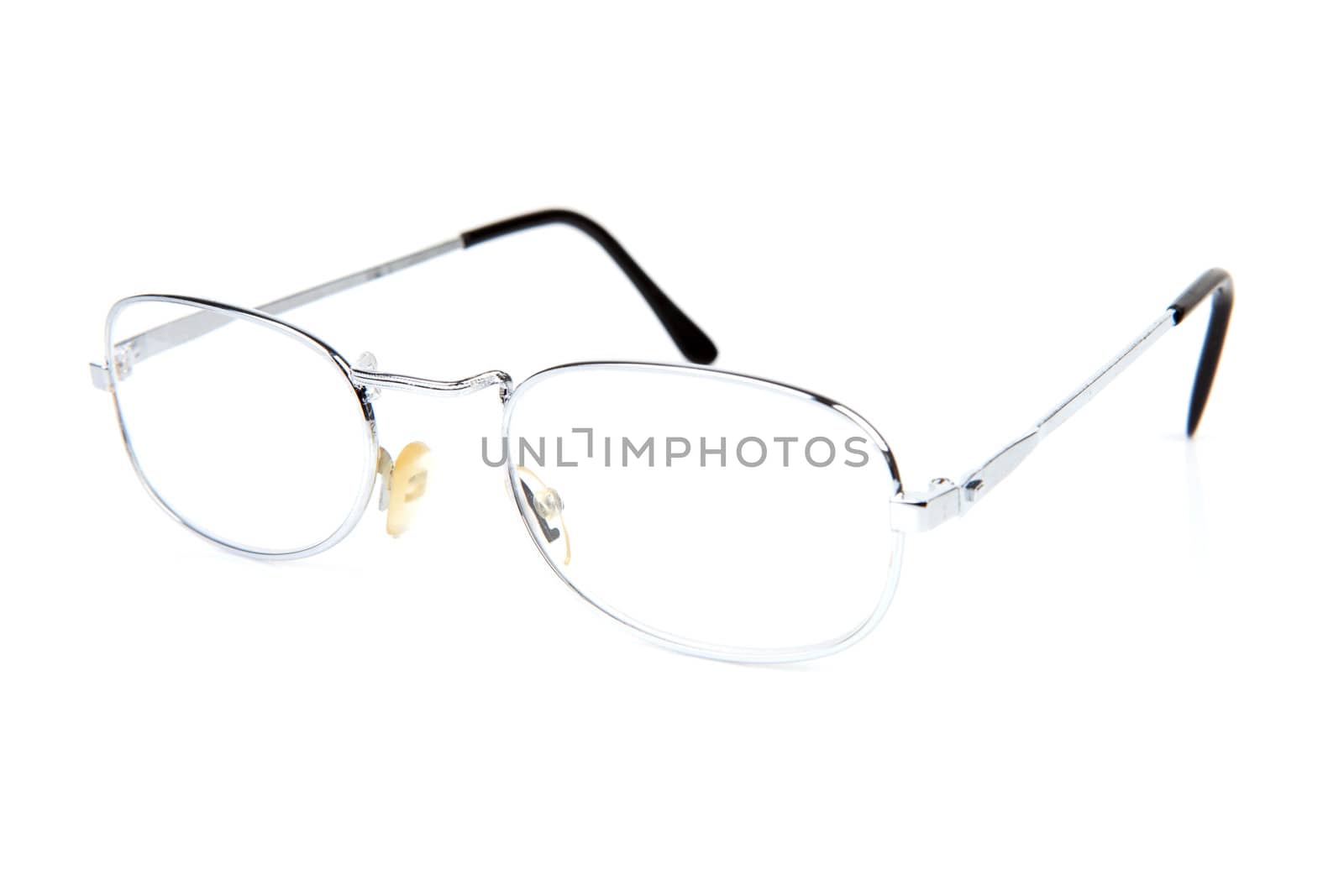 steel reading glasses isolated on white background