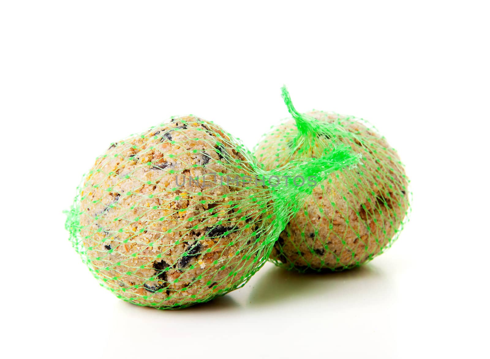 Fat balls; winter food for birds over white background 
