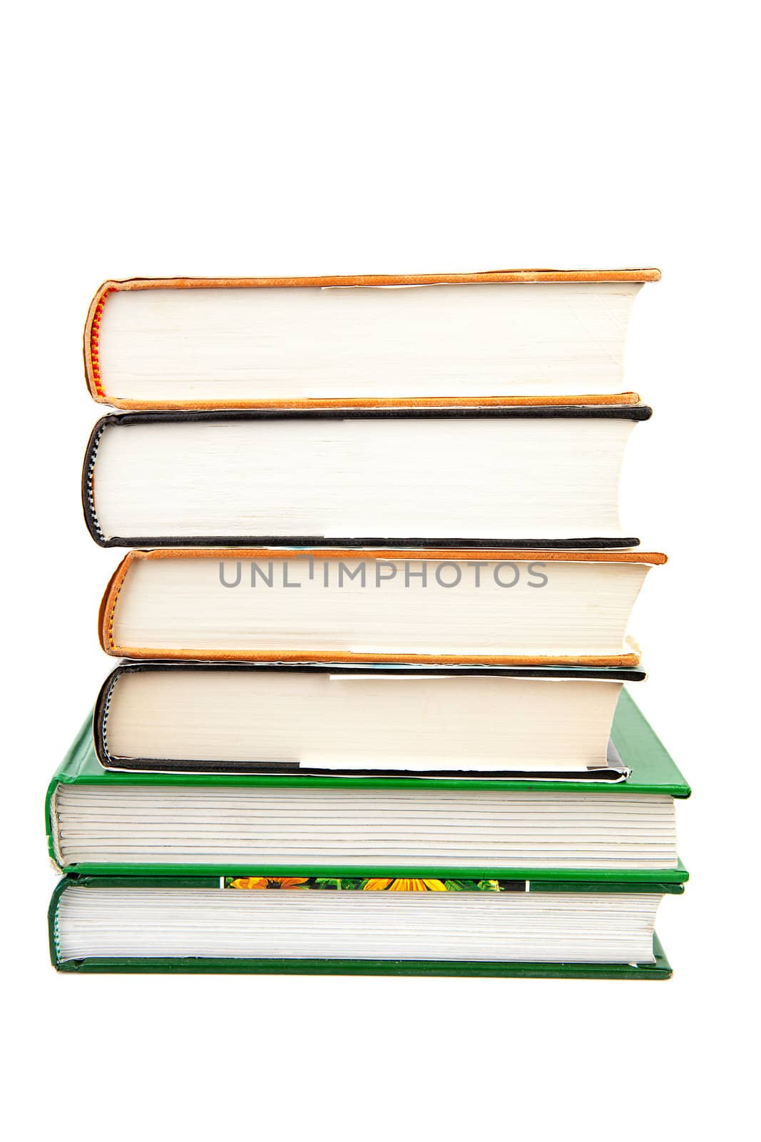 Six books stacked over white background