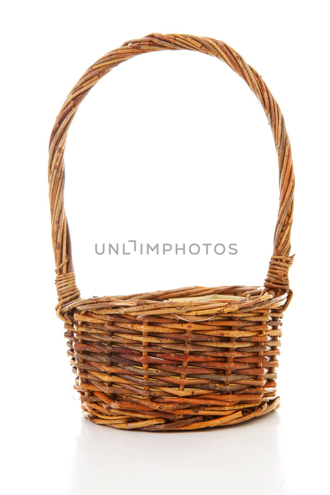 Empty cane basket isolated on white background 
