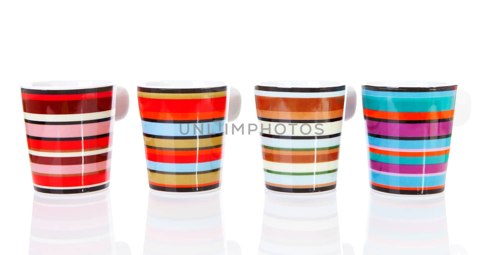Four colorful empty coffee cups in a row over white background