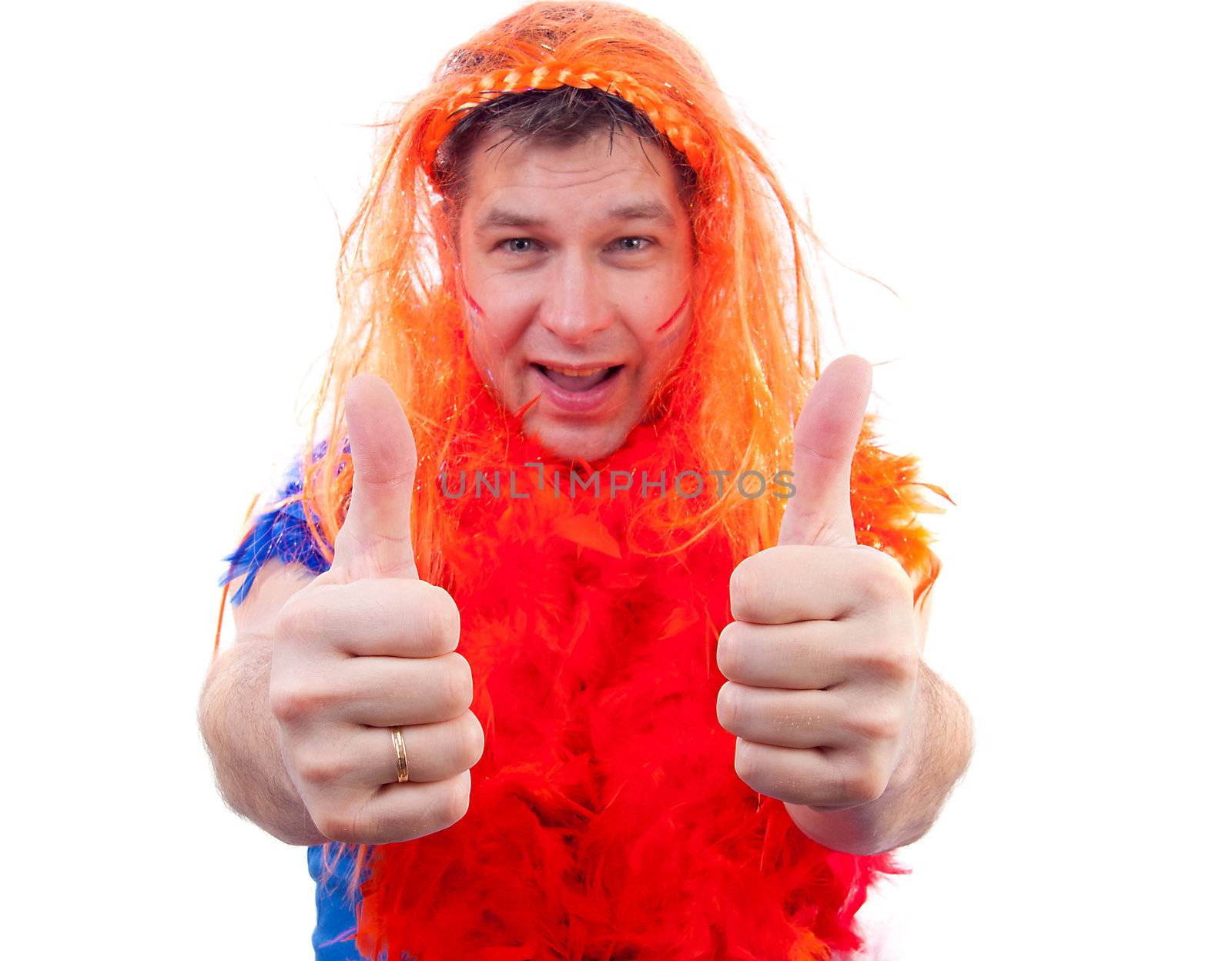 Man is posing in orange outfit for soccer game with thumbs up over white background with focus on thumbs