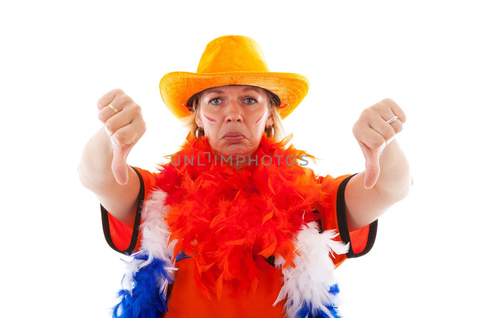 Dutch female soccer supporter in orange outfit with thumbs down over white background