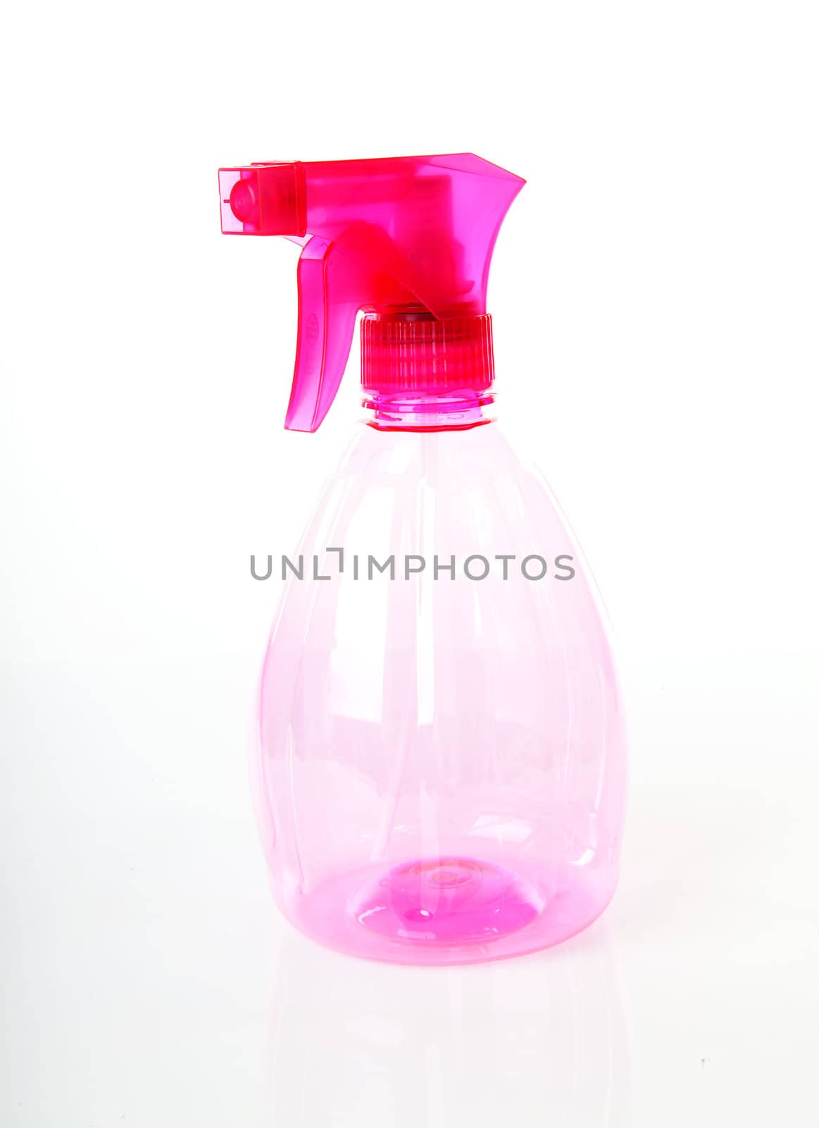 Pink plastic water plant sprayer over white background