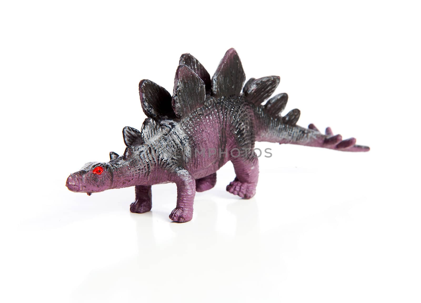 plastic dinosaur toy isolated on white background