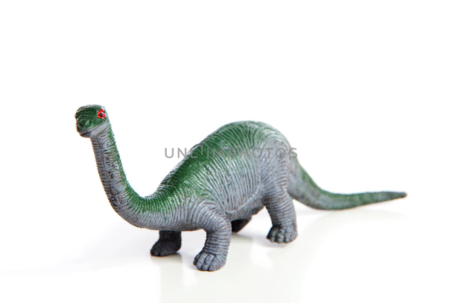 plastic dinosaur toy isolated on white background