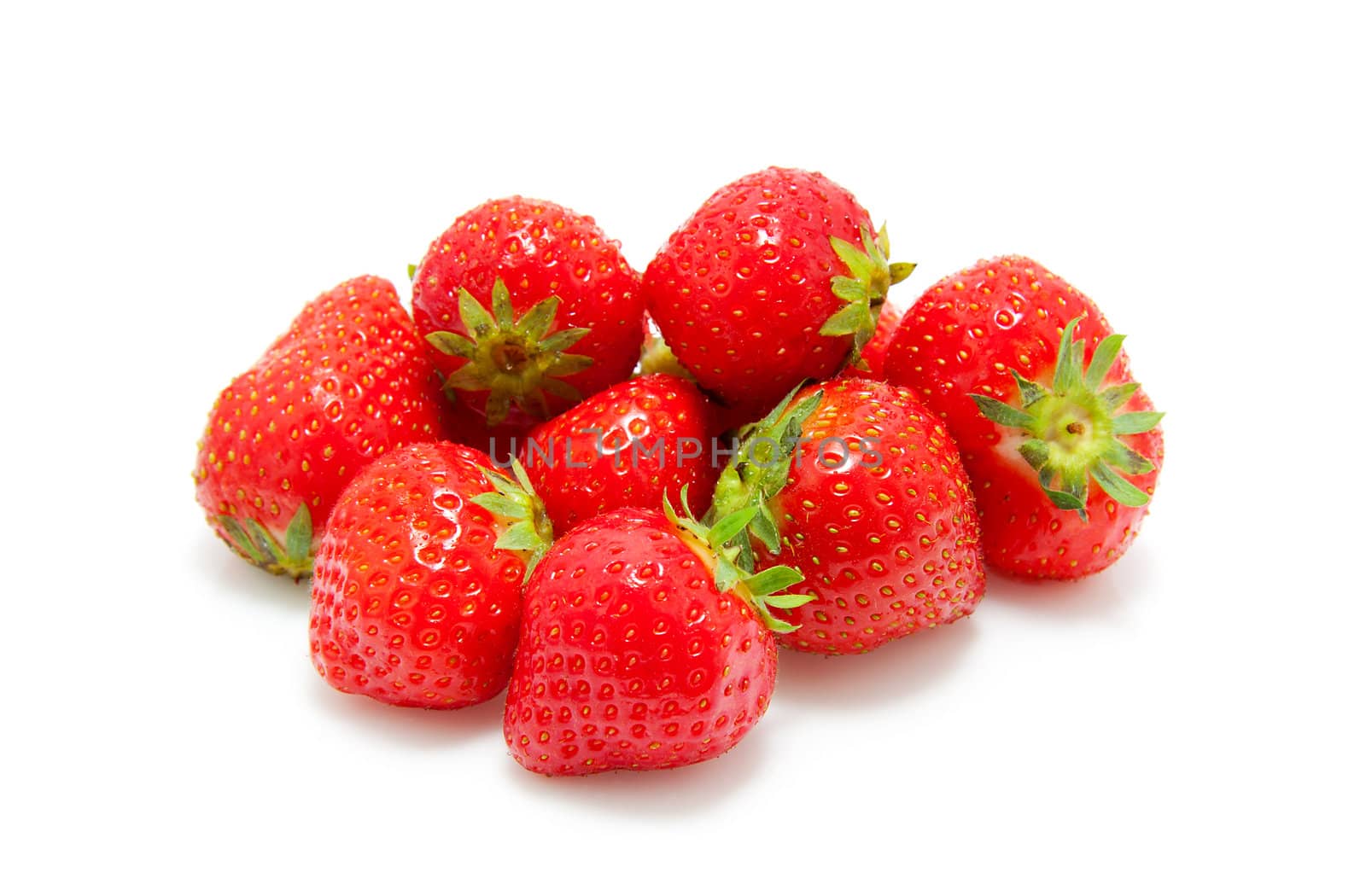 pile of strawberry fruit on white background