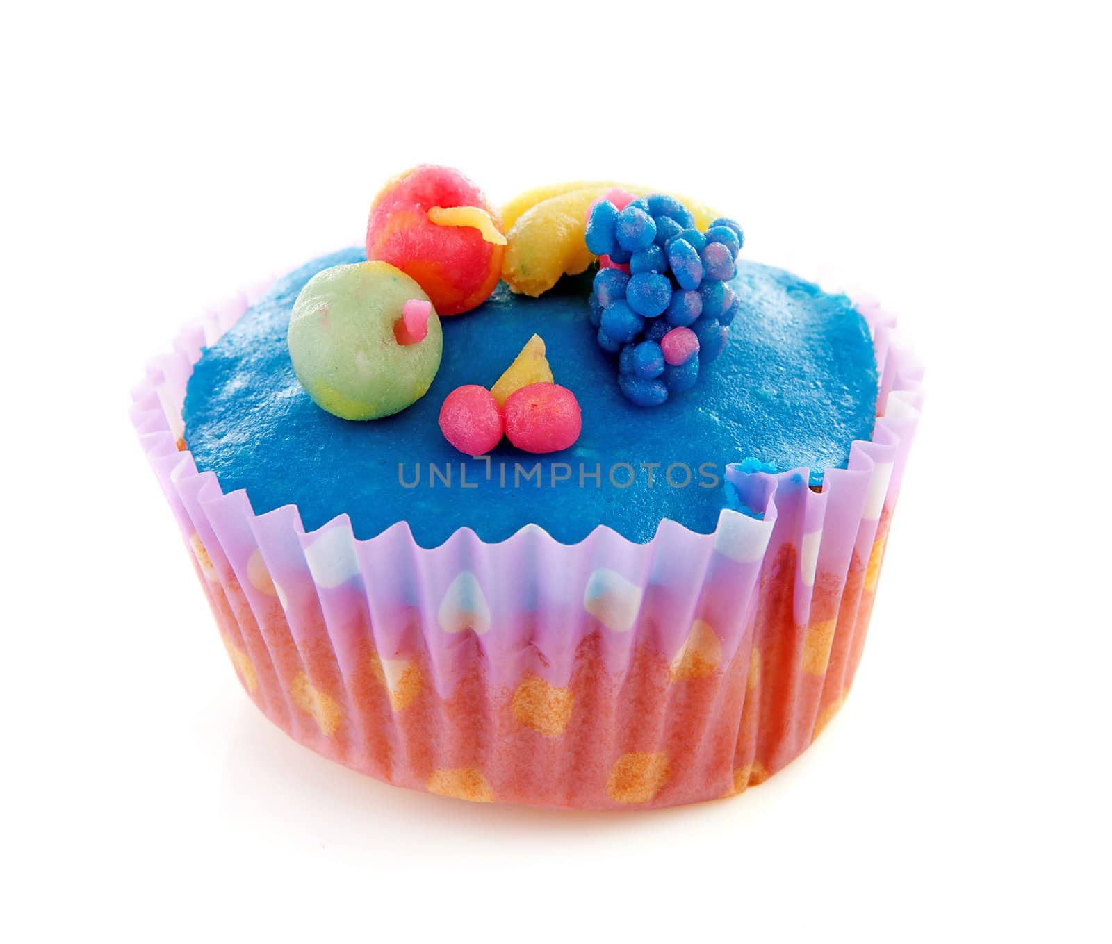 cupcake with marzipan decoration over white background