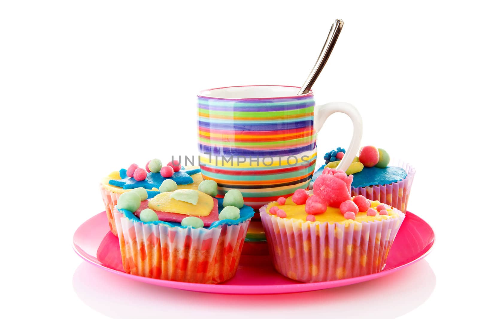 Pink plate with cup of coffee and cupcakes over white background