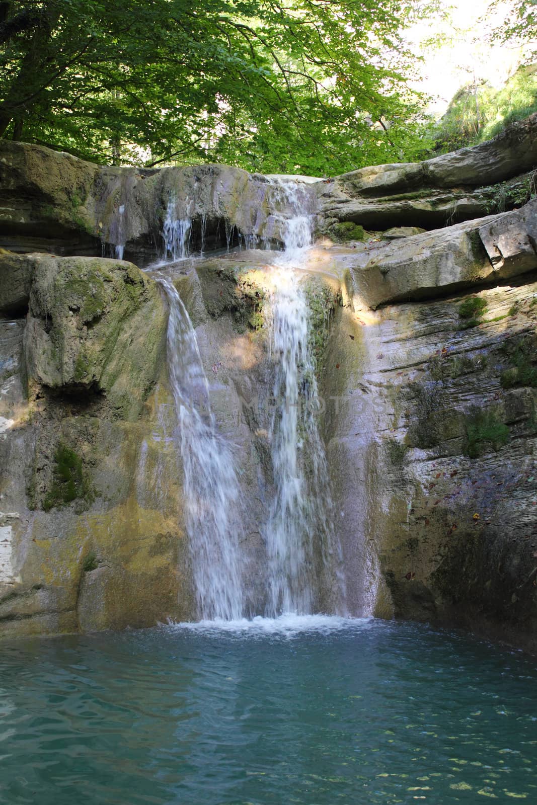 Waterfall on the mountain river.