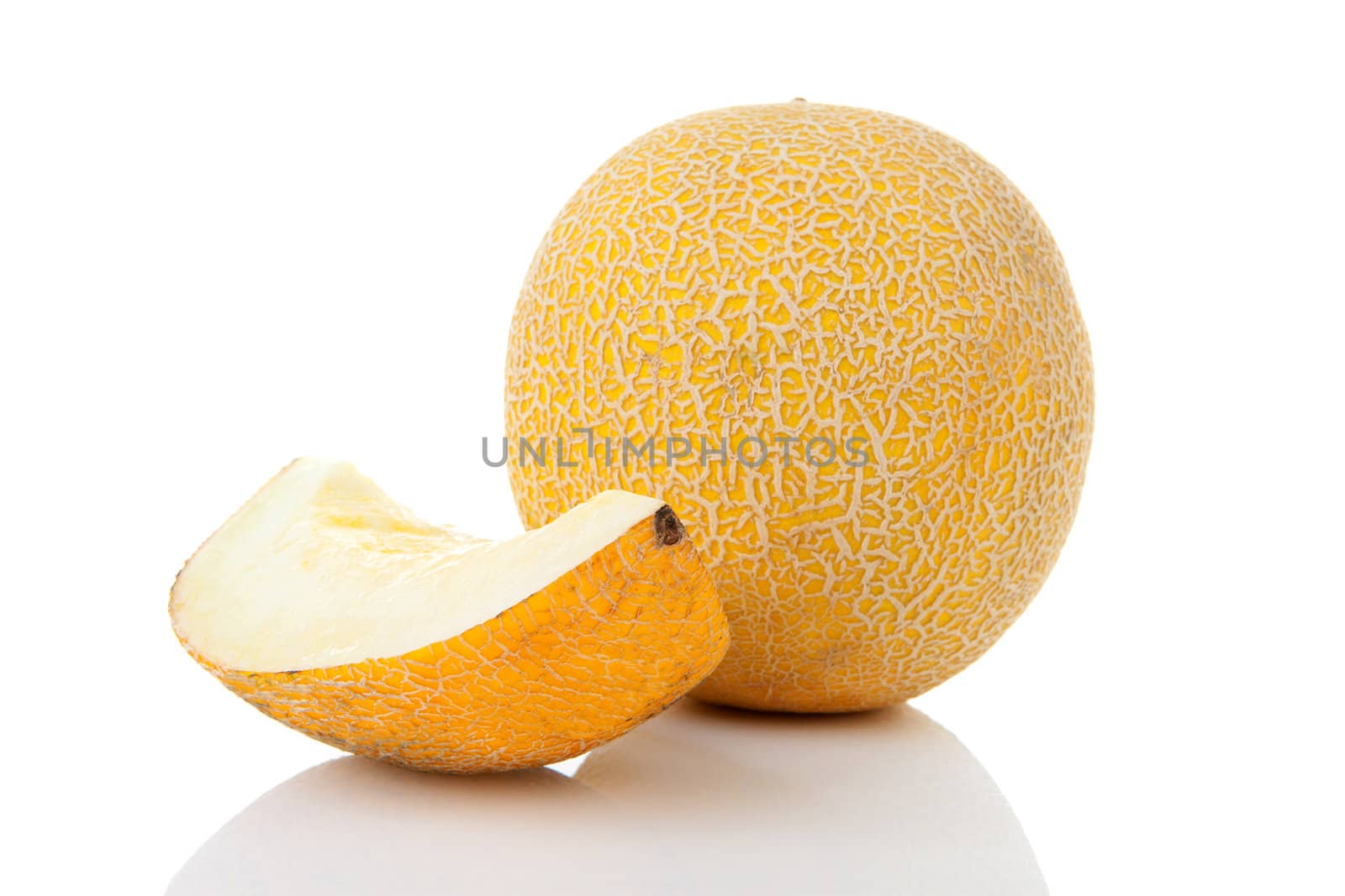 Fresh yellow cantaloupe melon isolated on white background