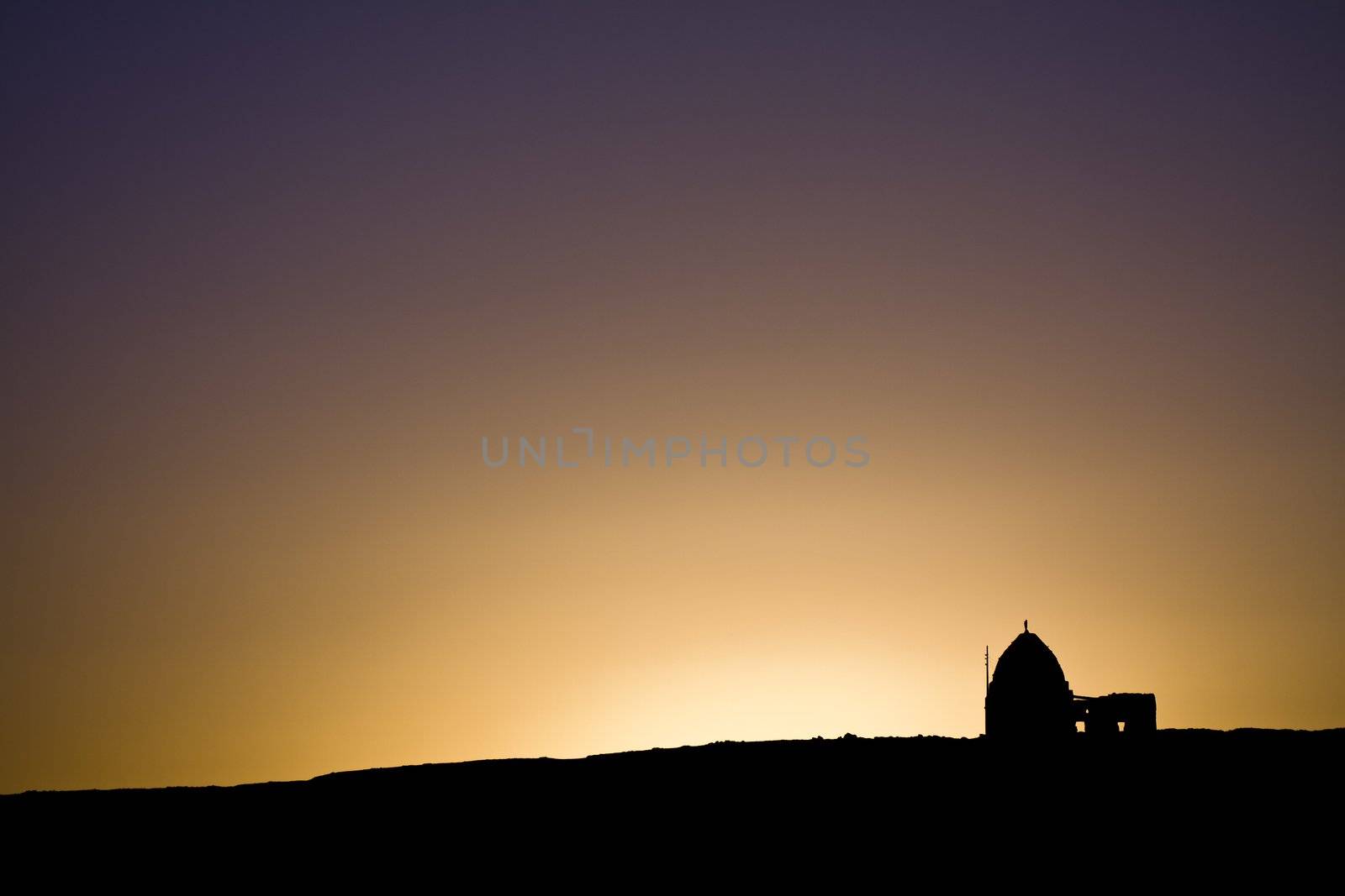 Ancient ruins in the light of the sunset, near Nile in Egypt