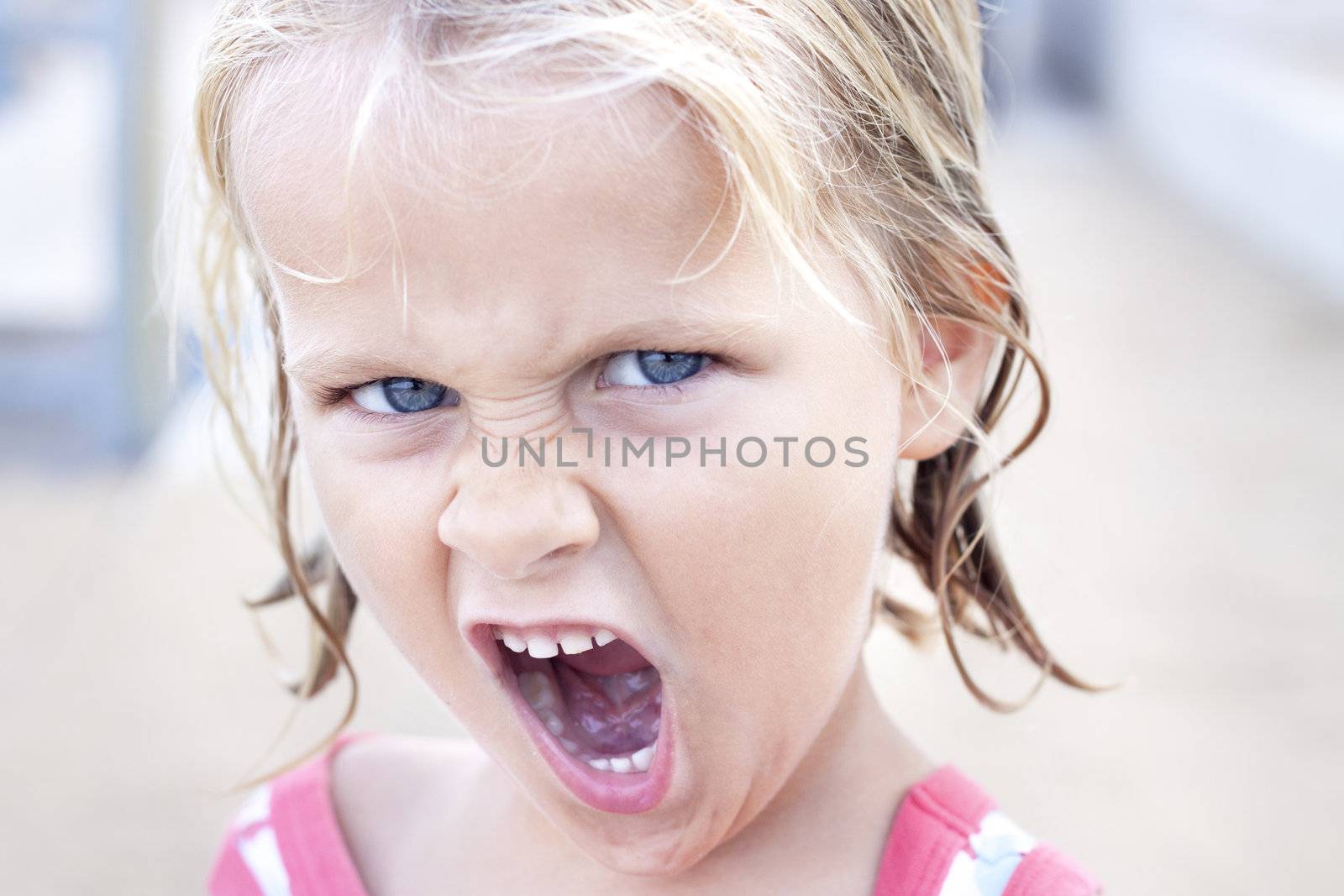 Cheeky girl doing a silly face