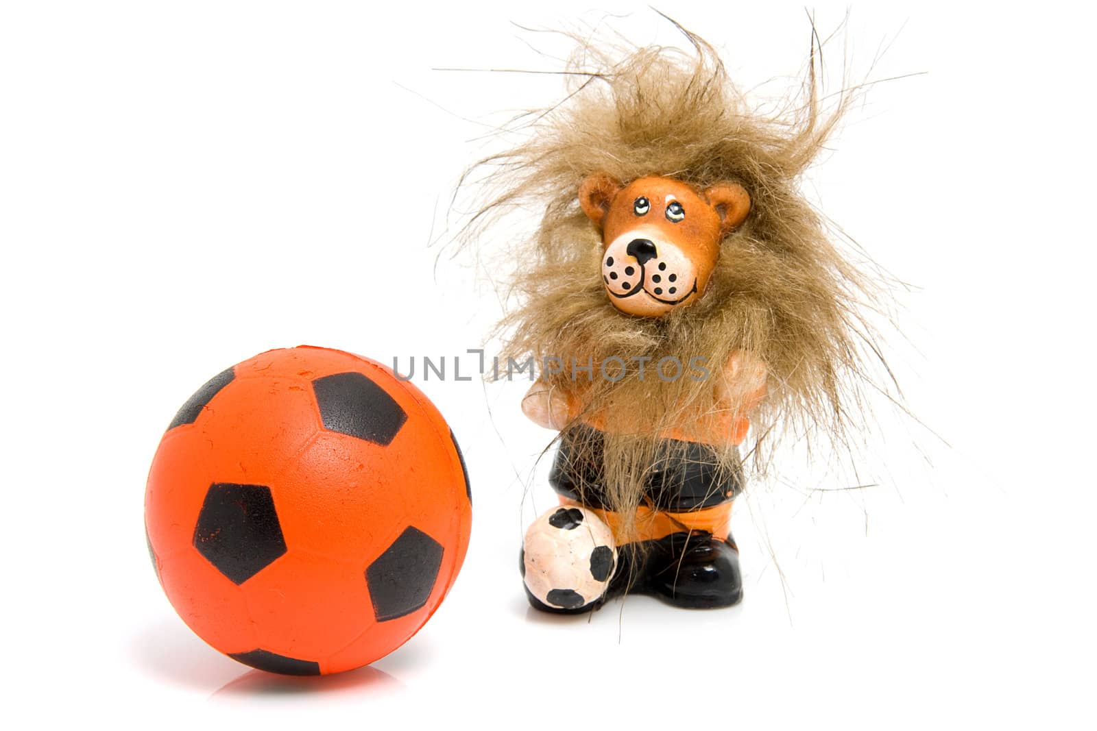 Orange soccer ball and lion isolated on white background