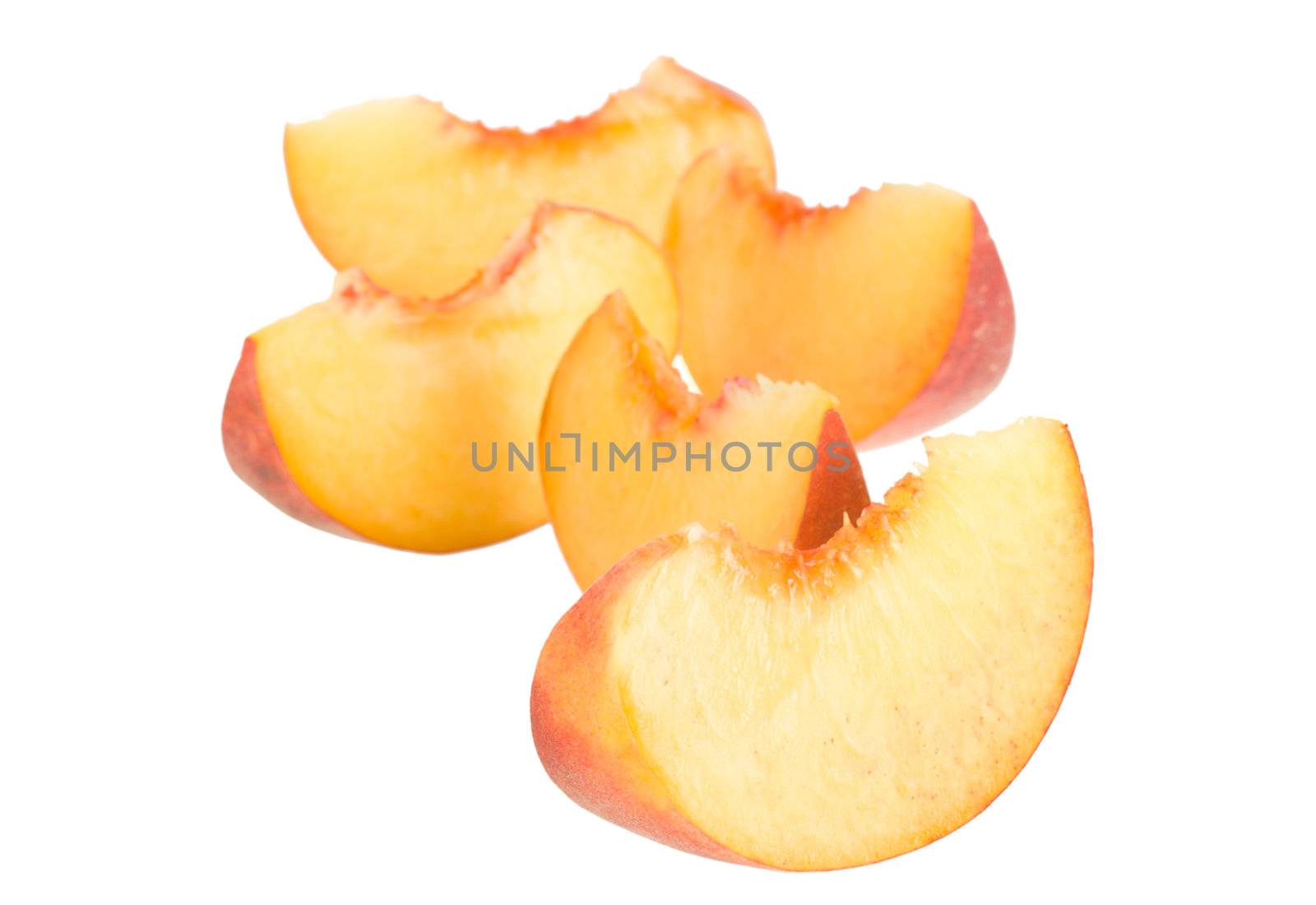 many peaces of peach, isolated on white