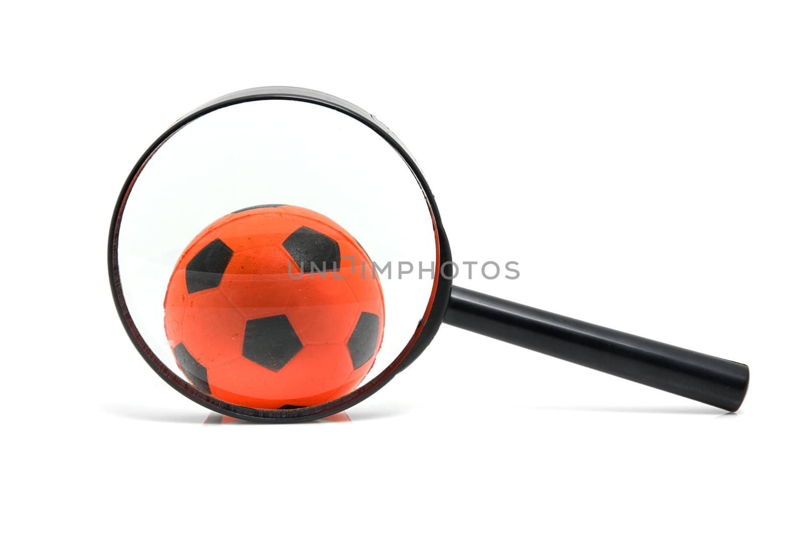 black magnifying glass with orange soccer ball isolated on white background
