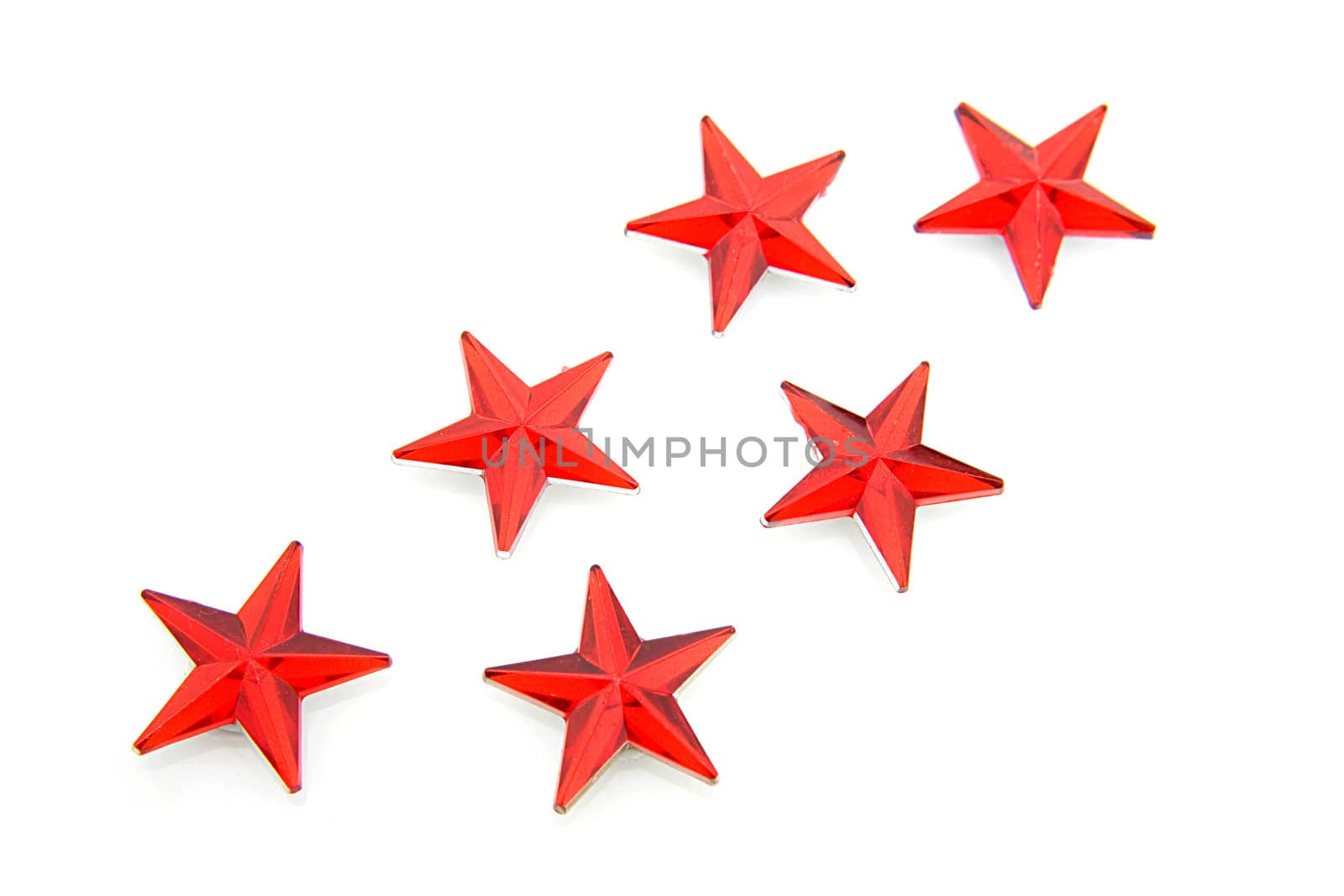 Red stars confetti over white background