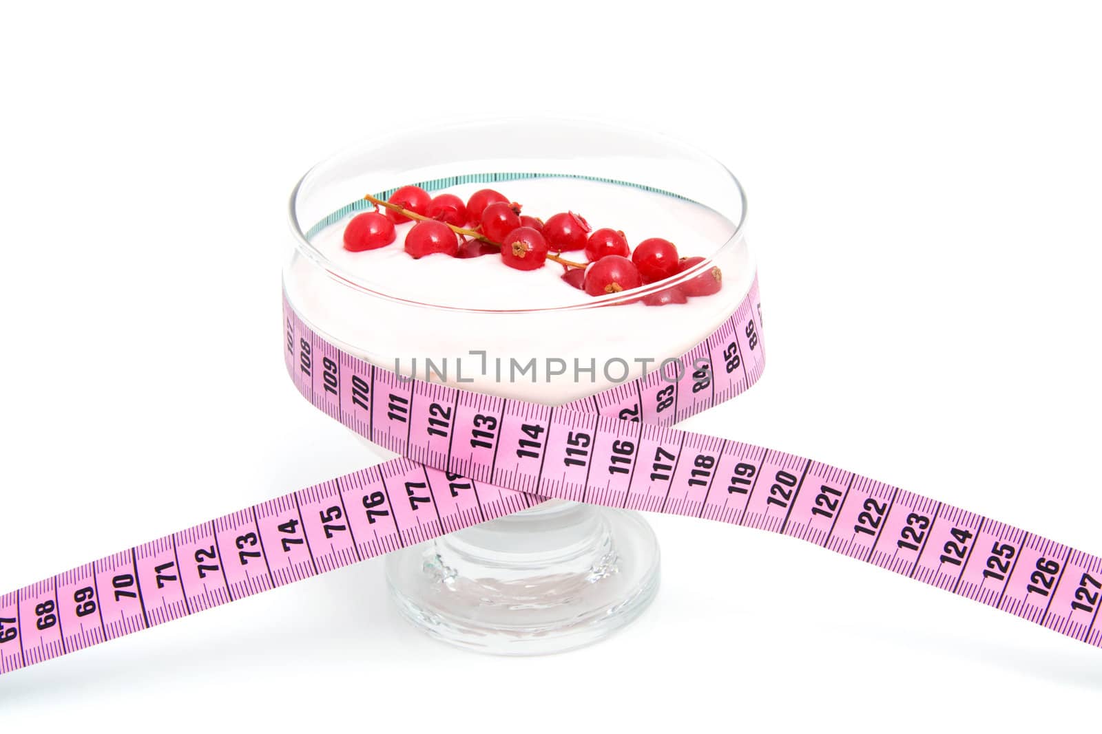 glass bowl with yogurt,berrie fruit and measure tape for dieting over white background