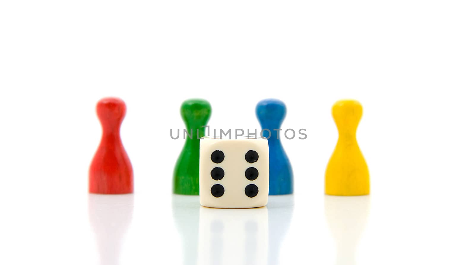 four colorful pawns with white dice over white background