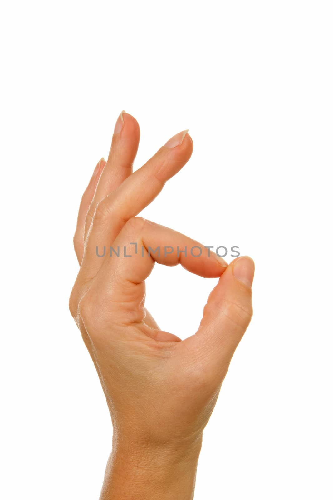 Woman's hand making OK sign over white background