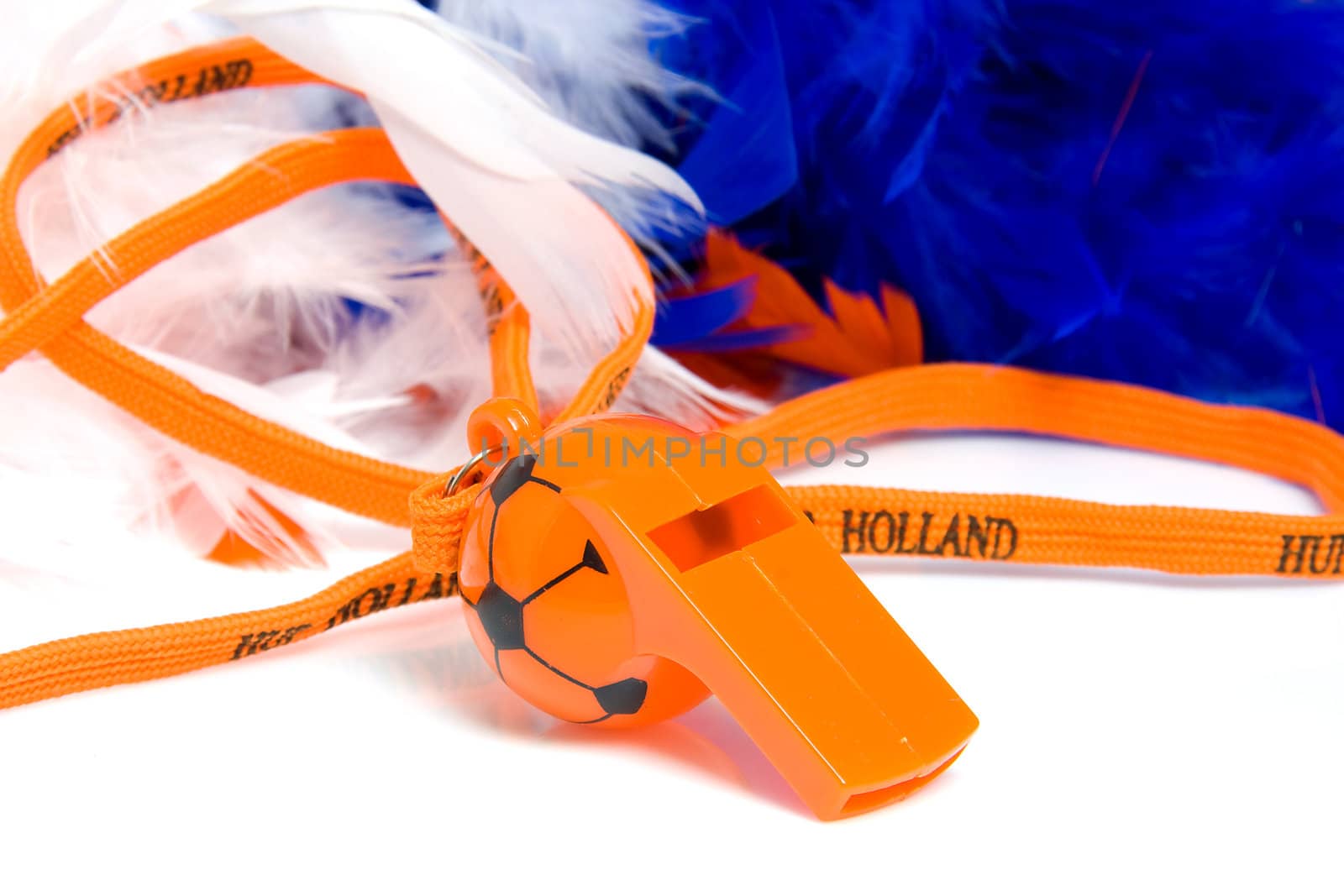 Orange flute in shape of soccer ball with accessories for Dutch game