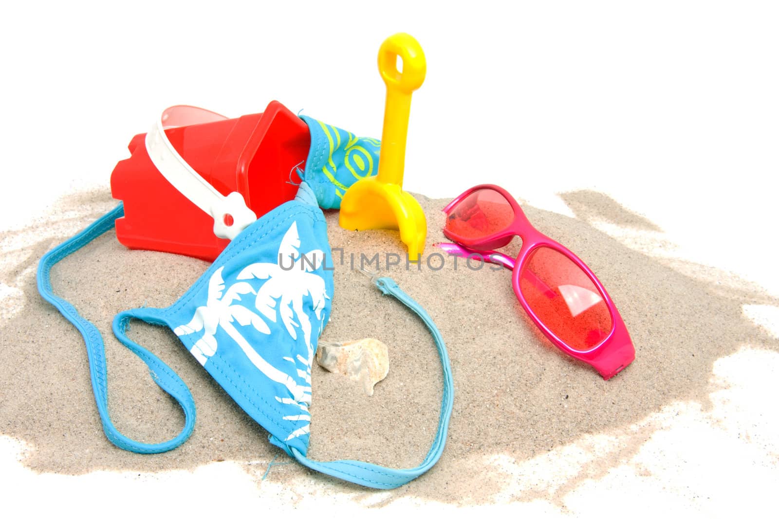 beach stuff on sand over white background