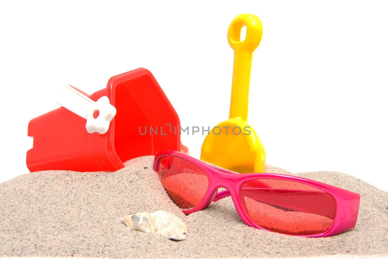 beach stuff on sand over white background