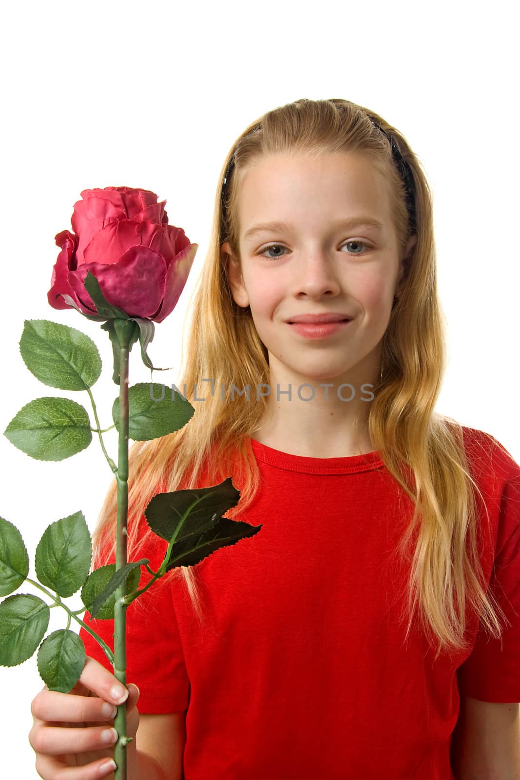 Young blonde girl with silk red rose over white background