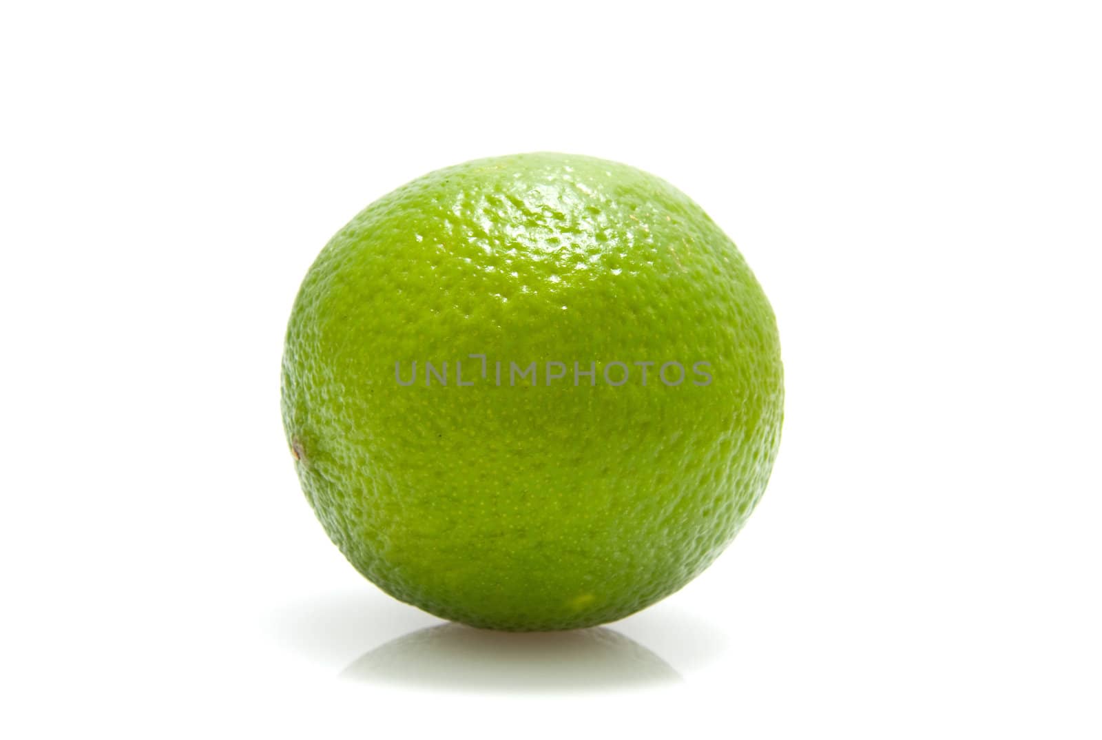Fresh green lime isolated on white background