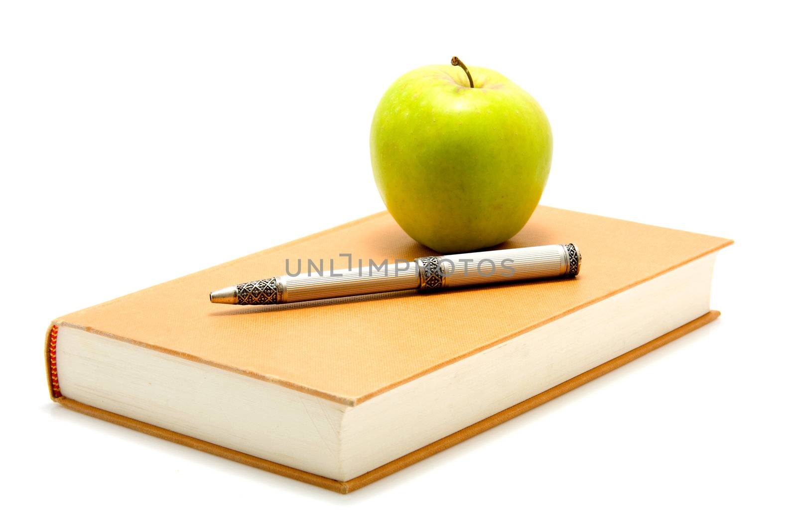 Student accessory with book, pen and apple over white background