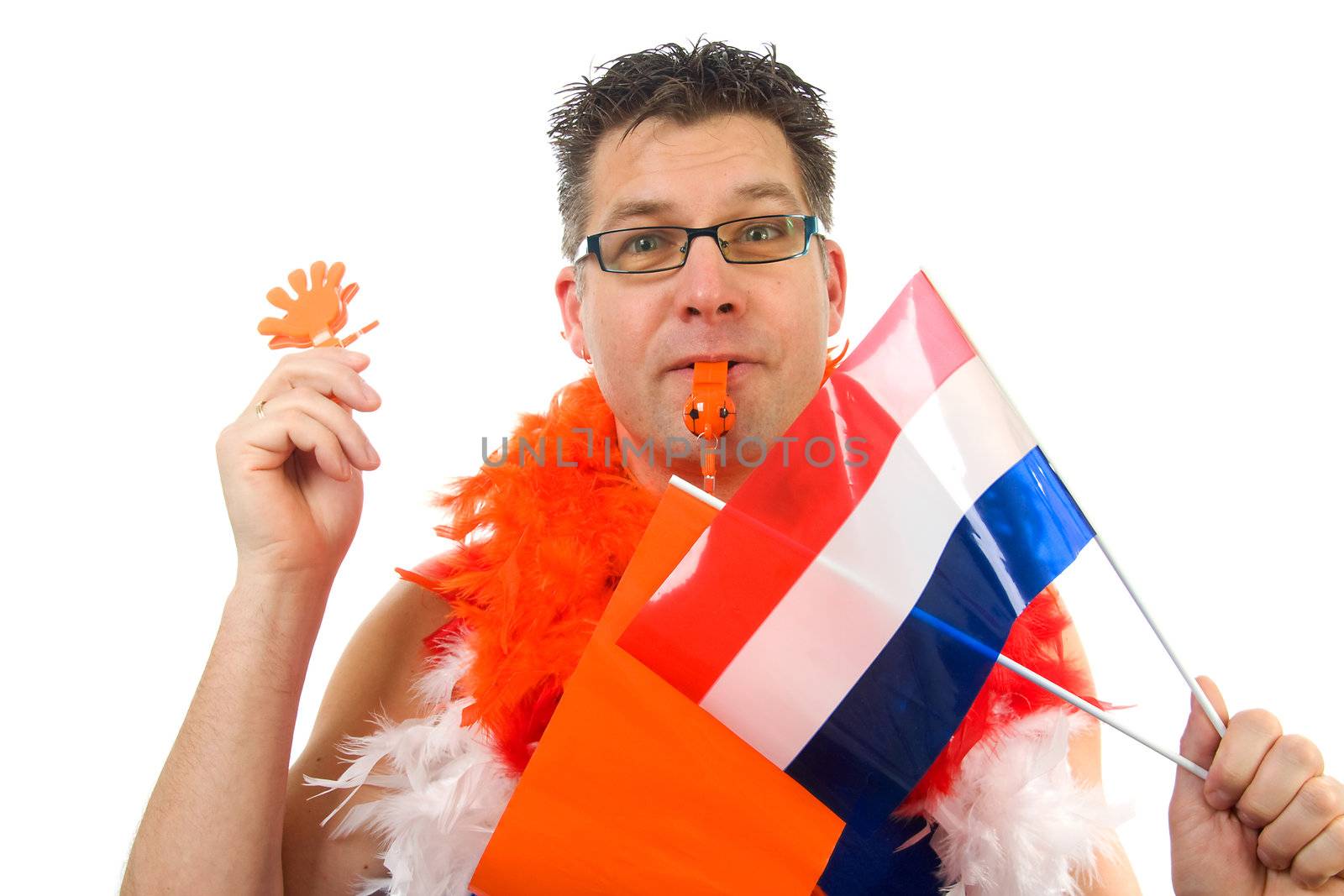 man is posing for soccer game with flag, flute and other accessories over white background