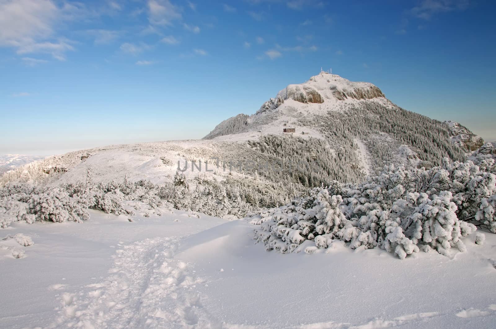 Mountain top in winter, Ceahlau mountains in Romania