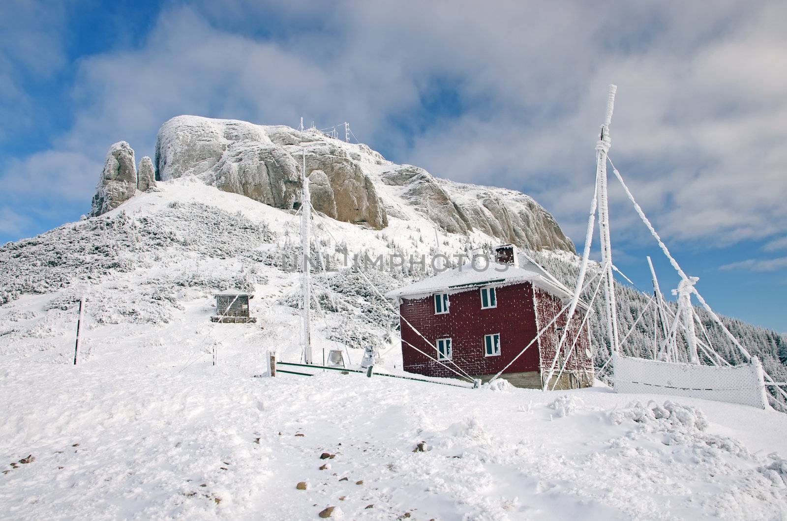 Snow climbers shelter on a mountain