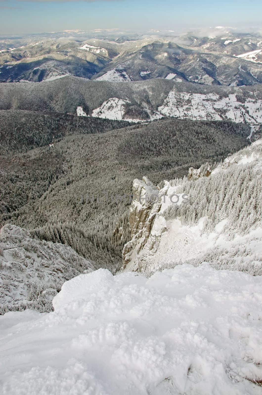 Snow mountains, view from the top of Ceahlau mountains