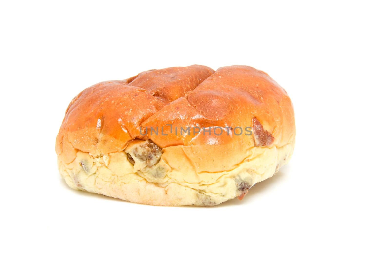 One raising bread also known as Dutch krentenbol, isolated on white background
