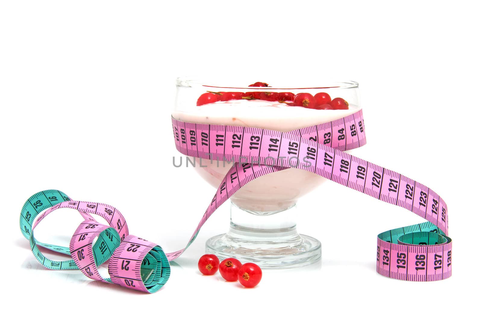 glass bowl with yogurt,berrie fruit and measure tape for dieting over white background