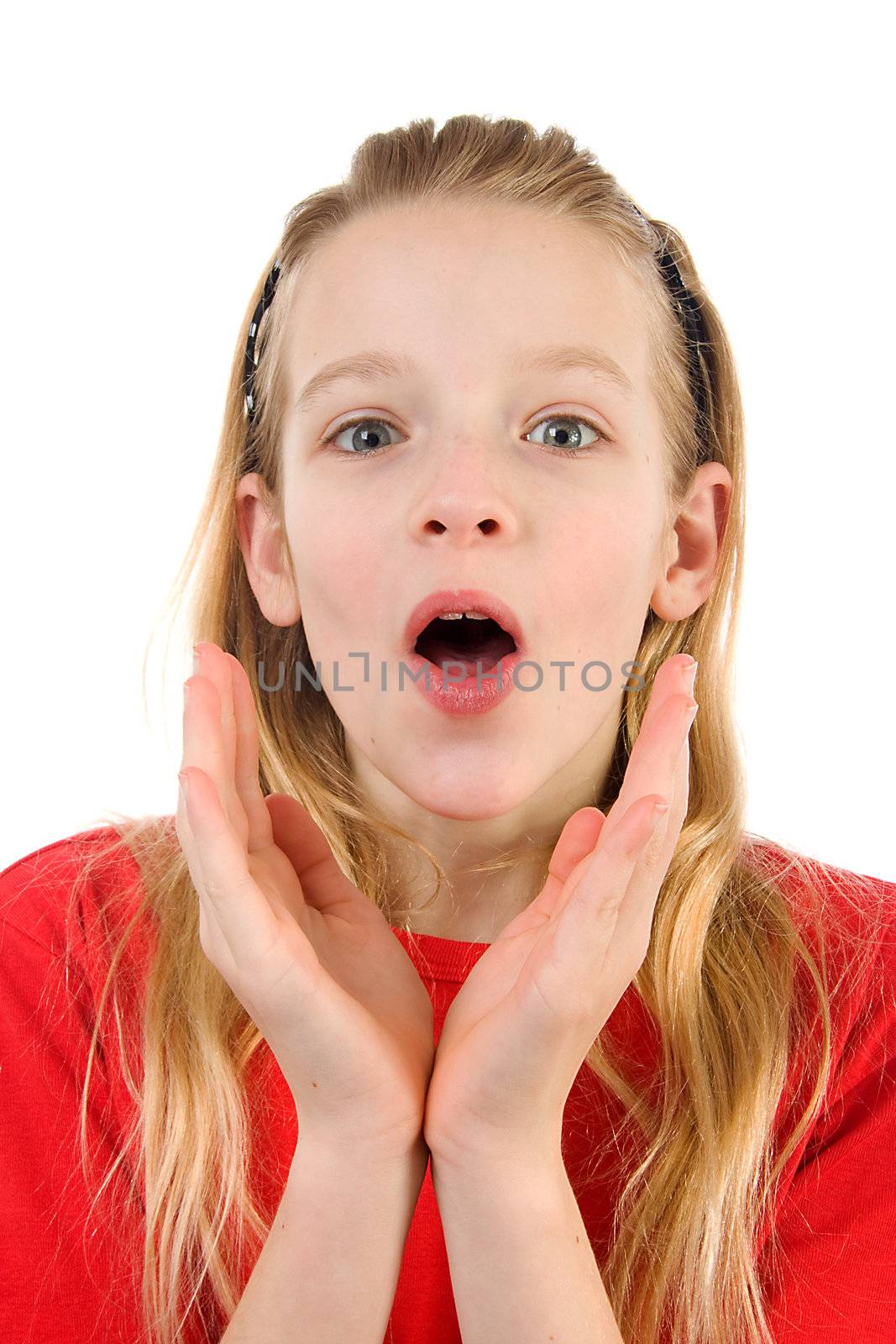 young blonde girl is looking surprised over white background